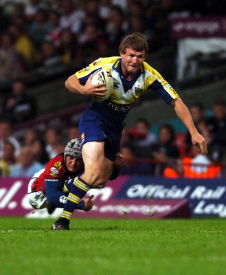 06.05.07 -Salford City Reds v Warrington Wolves Warrington's Mark Gleeson tries to break a David Berthelene tackle 