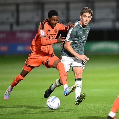 010926 - Salford City v Newport County - Sky Bet League 2 - Harrison Biggins of Newport County is challenged by Adebola Oluwo of Salford