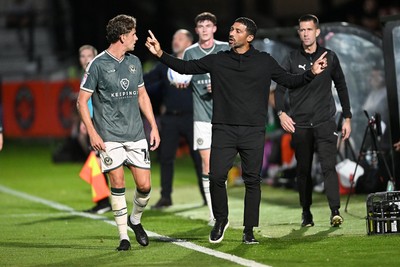 010926 - Salford City v Newport County - Sky Bet League 2 - Newport County Head Coach, Hayden Mullins speaks with Harrison Biggins of Newport County