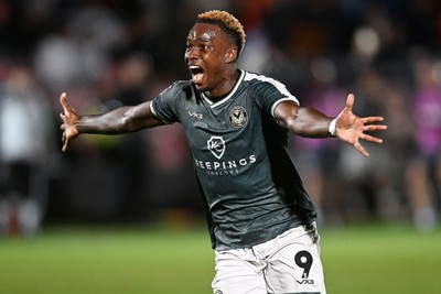 010926 - Salford City v Newport County - Sky Bet League 2 - Shaquille Gwengwe of Newport County runs towards the Newport supporters in celebration after Harrison Biggins of Newport County scores a goal from distance
