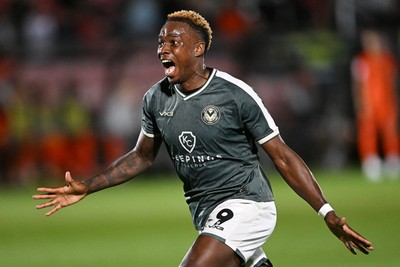 010926 - Salford City v Newport County - Sky Bet League 2 - Shaquille Gwengwe of Newport County runs towards the Newport supporters in celebration after Harrison Biggins of Newport County scores a goal from distance