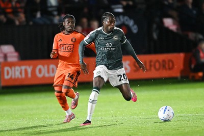 010926 - Salford City v Newport County - Sky Bet League 2 - Yahya Bamba of Newport County is challenged by Abraham Odoh of Salford