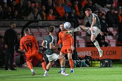 010926 - Salford City v Newport County - Sky Bet League 2 - Lee Jenkins of Newport County wins the ball in the air