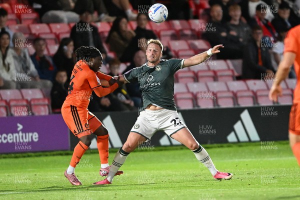 010926 - Salford City v Newport County - Sky Bet League 2 - Cameron Norman of Newport County is challenged by Abraham Odoh of Salford