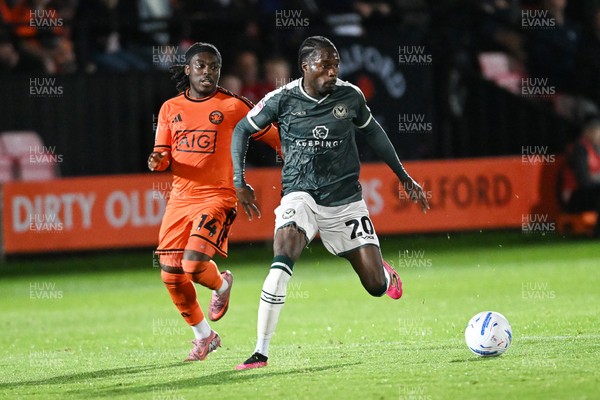 010926 - Salford City v Newport County - Sky Bet League 2 - Yahya Bamba of Newport County is challenged by Abraham Odoh of Salford