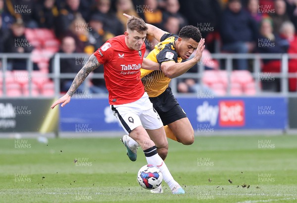 040323 - Salford City v Newport County - Sky Bet League 2 - Priestley Farquharson of Newport County and Callum Hendry of Salford City