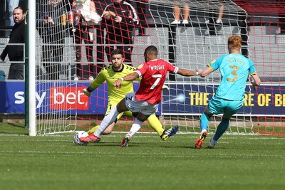 280821 - Salford City v Newport County, Sky Bet League 2 - Tyreik Wright of Salford City beats Newport County goalkeeper Joe Day to score the opening goal