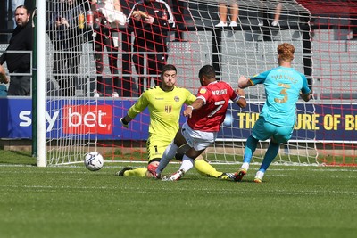 280821 - Salford City v Newport County, Sky Bet League 2 - Tyreik Wright of Salford City beats Newport County goalkeeper Joe Day to score the opening goal