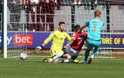 280821 - Salford City v Newport County, Sky Bet League 2 - Tyreik Wright of Salford City beats Newport County goalkeeper Joe Day to score the opening goal