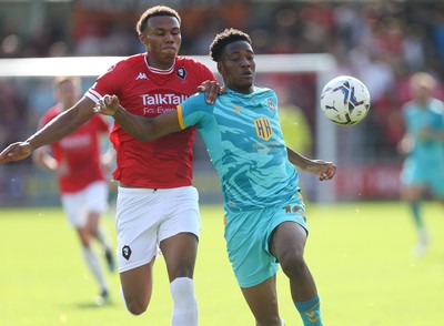 280821 - Salford City v Newport County, Sky Bet League 2 - Timmy Abraham of Newport County and Corrie Ndaba of Salford City compete for the ball