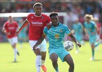 280821 - Salford City v Newport County, Sky Bet League 2 - Timmy Abraham of Newport County and Corrie Ndaba of Salford City compete for the ball