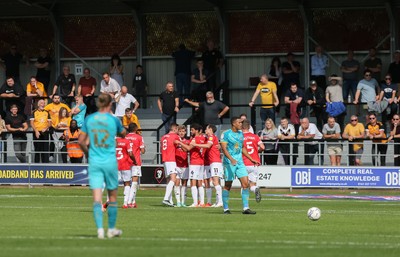 280821 - Salford City v Newport County, Sky Bet League 2 - Newport County fans look on as Salford City celebrate the third goal