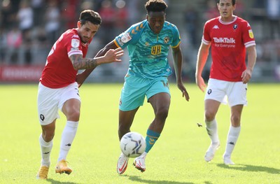 280821 - Salford City v Newport County, Sky Bet League 2 - Timmy Abraham of Newport County and Liam Shephard of Salford City compete for the ball