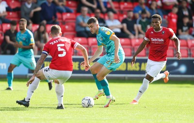 280821 - Salford City v Newport County, Sky Bet League 2 - Lewis Collins of Newport County takes on Ash Eastham of Salford City