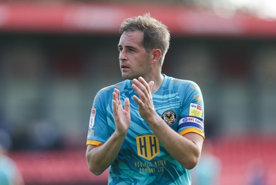 280821 - Salford City v Newport County, Sky Bet League 2 - Matty Dolan of Newport County applauds the travelling fans at the end of the match