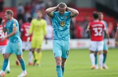 280821 - Salford City v Newport County, Sky Bet League 2 -Alex Fisher of Newport County reacts at the final whistle