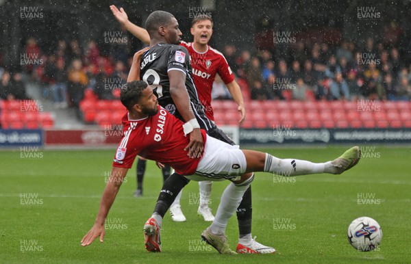 300923 - Salford City v Newport County - Sky Bet League 2 - Adrian Mariappa of Salford City takes the ball off Omar Bogle of Newport County