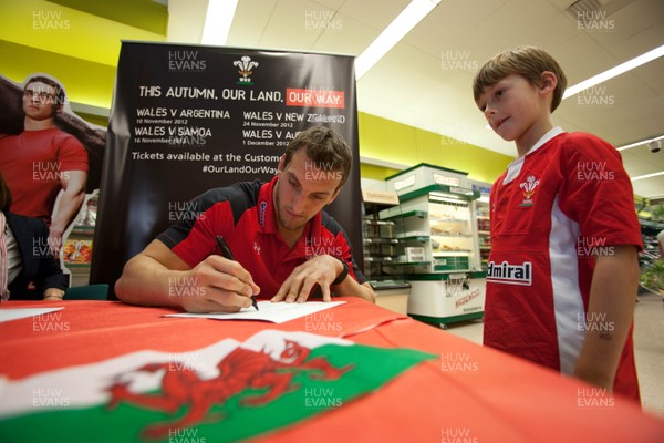 260812 - Wales Rugby captain Sam Warburton attends a signing session at TESCOS in Penarth Marina