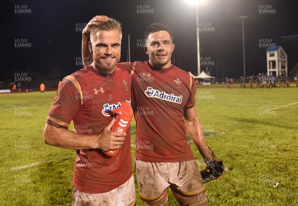 230617 - Samoa v Wales - Gareth Anscombe and Ellis Jenkins of Wales at the end of the game