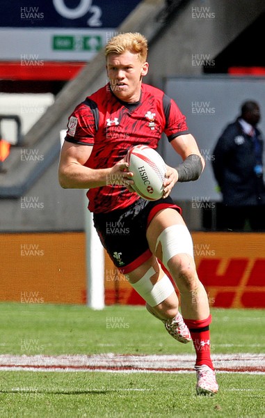 210617  - Samoa vs Wales - HSBC World Rugby Sevens Series -  Sam Cross of Wales on the attack  