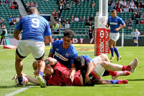 210617  - Samoa vs Wales - HSBC World Rugby Sevens Series -  Sam Cross of Wales scores their 5th and final try  