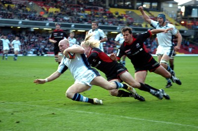 08.10.06  Saracens v Cardiff Blues  Blues Tom Shanklin dives in to score try despite tackle by David Seymour  