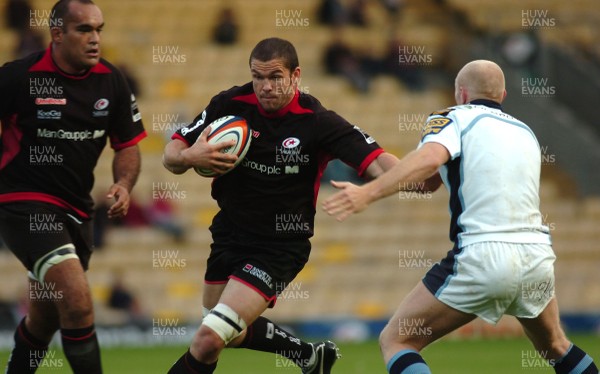 08.10.06 - Saracens v Cardiff Blues - EDF Energy Cup - Saracens Andy Farrell takes on Tom Shanklin 