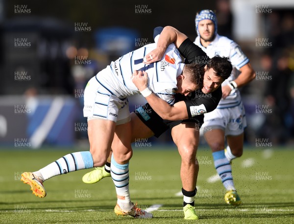 091218 - Saracens v Cardiff Blues - European Rugby Champions Cup - Jason Harries of Cardiff Blues is tackled by Sean Maitland of Saracens