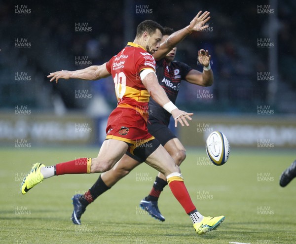 270118 - Saracens v Dragons - Anglo Welsh Cup - Zane Kirchner of Dragons clears the ball 