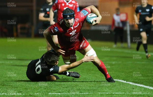 191121 - Scarlets Development v Ospreys A - Iestyn Rees of Scarlets is tackled by Josh Thomas of Ospreys just short of the try line