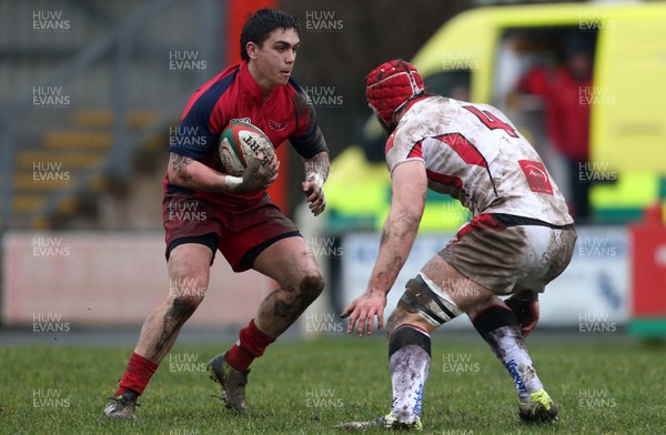 200118 - Scarlets Premiership Select v Ulster A - B&I Cup - Jacob Botica of Scarlets is tackled by Peter Browne of Ulster
