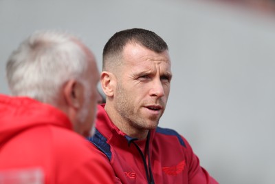 060925 - Scarlets Preseason Friendlies - Scarlets play preseason friendlies v Regional SRC Clubs Llandovery RFC and Carmarthen Quins RFC - Gareth Davies of Scarlets chats to supporters on the sidelines   