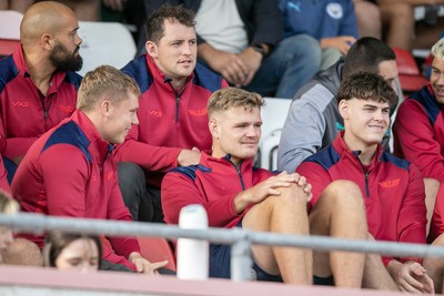 060925 - Scarlets Preseason Friendlies - Scarlets play preseason friendlies v Regional SRC Clubs Llandovery RFC and Carmarthen Quins RFC - Sam Costello Taine Plumtree and Eddie James watch from the stands    