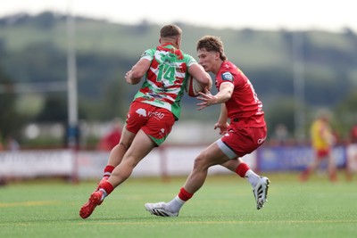 060925 - Scarlets Preseason Friendlies - Scarlets play preseason friendlies v Regional SRC Clubs Llandovery RFC and Carmarthen Quins RFC - Ned Bennett of Llandovery attacks Ellis Mee of Scarlets  