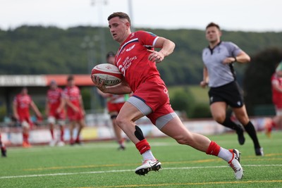 060925 - Scarlets Preseason Friendlies - Scarlets play preseason friendlies v Regional SRC Clubs Llandovery RFC and Carmarthen Quins RFC - Dane Blacker of Scarlets runs in a try 