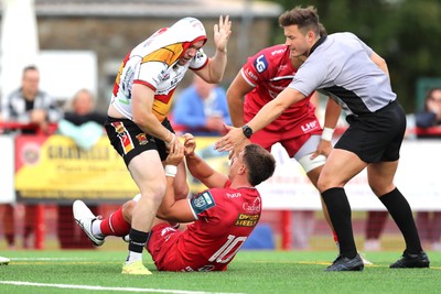 060925 - Scarlets Preseason Friendlies - Scarlets play preseason friendlies v Regional SRC Clubs Llandovery RFC and Carmarthen Quins RFC - Steff Evans of Carmarthen Quins and Joe Hawkins of Scarlets tangle   