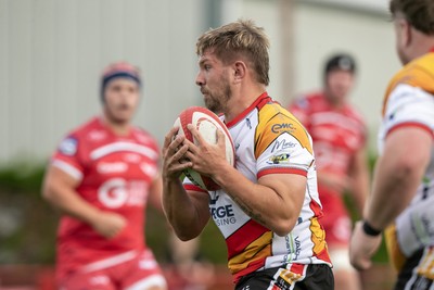 060925 - Scarlets Preseason Friendlies - Scarlets play preseason friendlies v Regional SRC Clubs Llandovery RFC and Carmarthen Quins RFC - Shaun Evans of Carmarthen Quins on the charge   