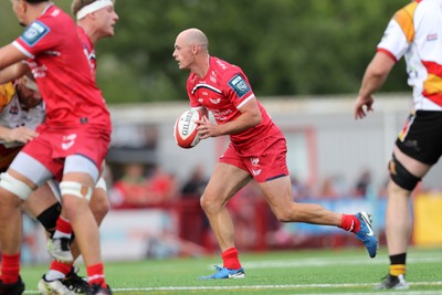 060925 - Scarlets Preseason Friendlies - Scarlets play preseason friendlies v Regional SRC Clubs Llandovery RFC and Carmarthen Quins RFC - Ioan Nicholas of Scarlets looks for support  