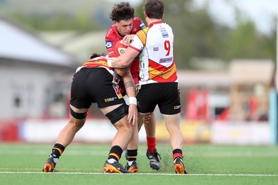 060925 - Scarlets Preseason Friendlies - Scarlets play preseason friendlies v Regional SRC Clubs Llandovery RFC and Carmarthen Quins RFC - Gabe Mcdonald of Scarlets is stopped by Rhodri Davies of Carmarthen Quins   