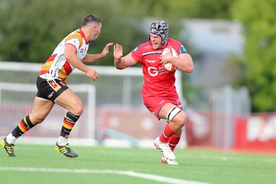 060925 - Scarlets Preseason Friendlies - Scarlets play preseason friendlies v Regional SRC Clubs Llandovery RFC and Carmarthen Quins RFC - Tristan Davies of Scarlets on the charge   