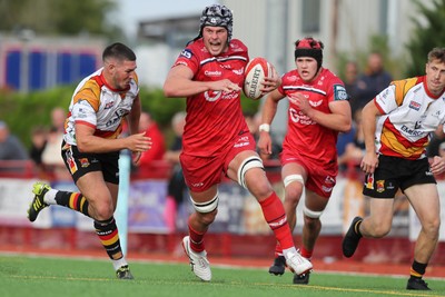 060925 - Scarlets Preseason Friendlies - Scarlets play preseason friendlies v Regional SRC Clubs Llandovery RFC and Carmarthen Quins RFC - Tristan Davies of Scarlets on the charge    