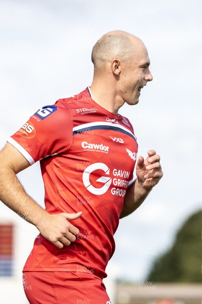 060925 - Scarlets Preseason Friendlies - Scarlets play preseason friendlies v Regional SRC Clubs Llandovery RFC and Carmarthen Quins RFC - Ioan Nicholas of Scarlets leads his team out  