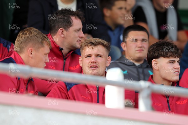060925 - Scarlets Preseason Friendlies - Scarlets play preseason friendlies v Regional SRC Clubs Llandovery RFC and Carmarthen Quins RFC - Sam Costello Taine Plumtree and Eddie James watch from the stands   