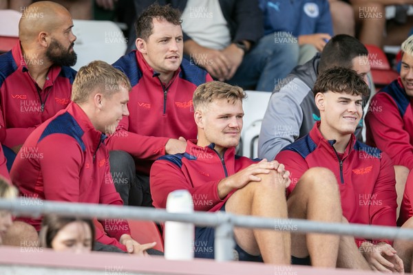 060925 - Scarlets Preseason Friendlies - Scarlets play preseason friendlies v Regional SRC Clubs Llandovery RFC and Carmarthen Quins RFC - Sam Costello Taine Plumtree and Eddie James watch from the stands    