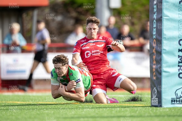 060925 - Scarlets Preseason Friendlies - Scarlets play preseason friendlies v Regional SRC Clubs Llandovery RFC and Carmarthen Quins RFC - Kian Abraham of Llandovery stops a Tomi Lewis of Scarlets try  