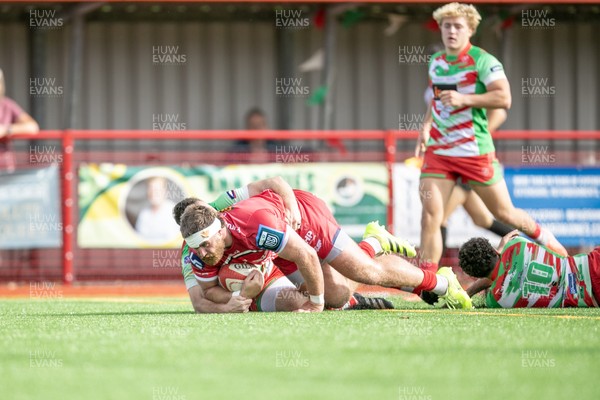 060925 - Scarlets Preseason Friendlies - Scarlets play preseason friendlies v Regional SRC Clubs Llandovery RFC and Carmarthen Quins RFC - Kemsley Mathias of Scarlets scores a try   