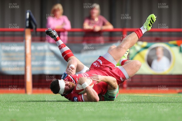 060925 - Scarlets Preseason Friendlies - Scarlets play preseason friendlies v Regional SRC Clubs Llandovery RFC and Carmarthen Quins RFC - Kemsley Mathias of Scarlets scores a try   