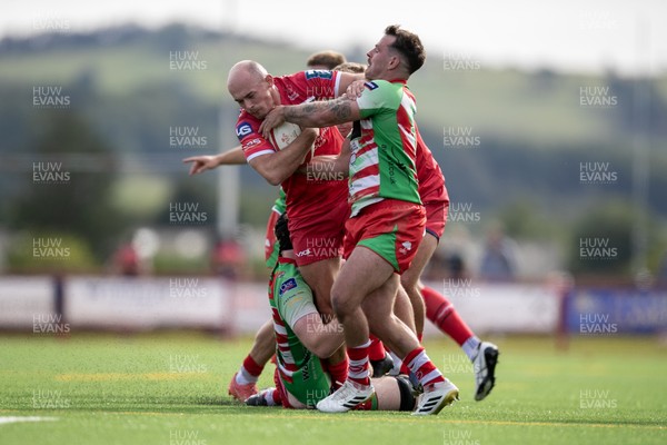 060925 - Scarlets Preseason Friendlies - Scarlets play preseason friendlies v Regional SRC Clubs Llandovery RFC and Carmarthen Quins RFC - Ioan Nicholas of Scarlets and Rhodri Jones of Llandovery tangle  