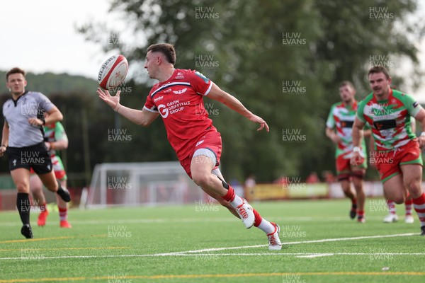 060925 - Scarlets Preseason Friendlies - Scarlets play preseason friendlies v Regional SRC Clubs Llandovery RFC and Carmarthen Quins RFC - Dane Blacker of Scarlets gathers the ball to score   