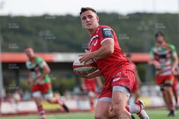 060925 - Scarlets Preseason Friendlies - Scarlets play preseason friendlies v Regional SRC Clubs Llandovery RFC and Carmarthen Quins RFC - Dane Blacker of Scarlets runs in a try  